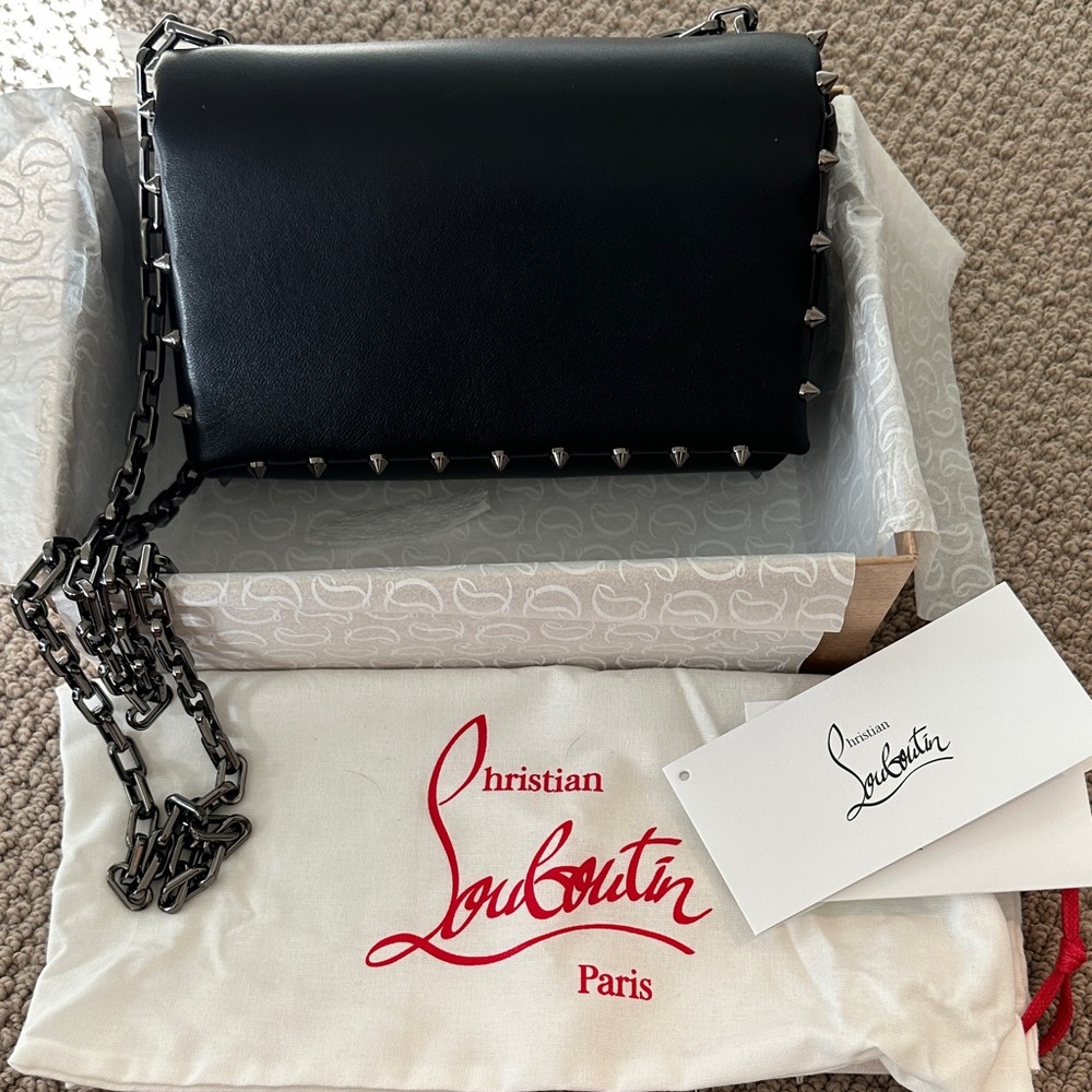 Christian Louboutin black leather bag with red interior